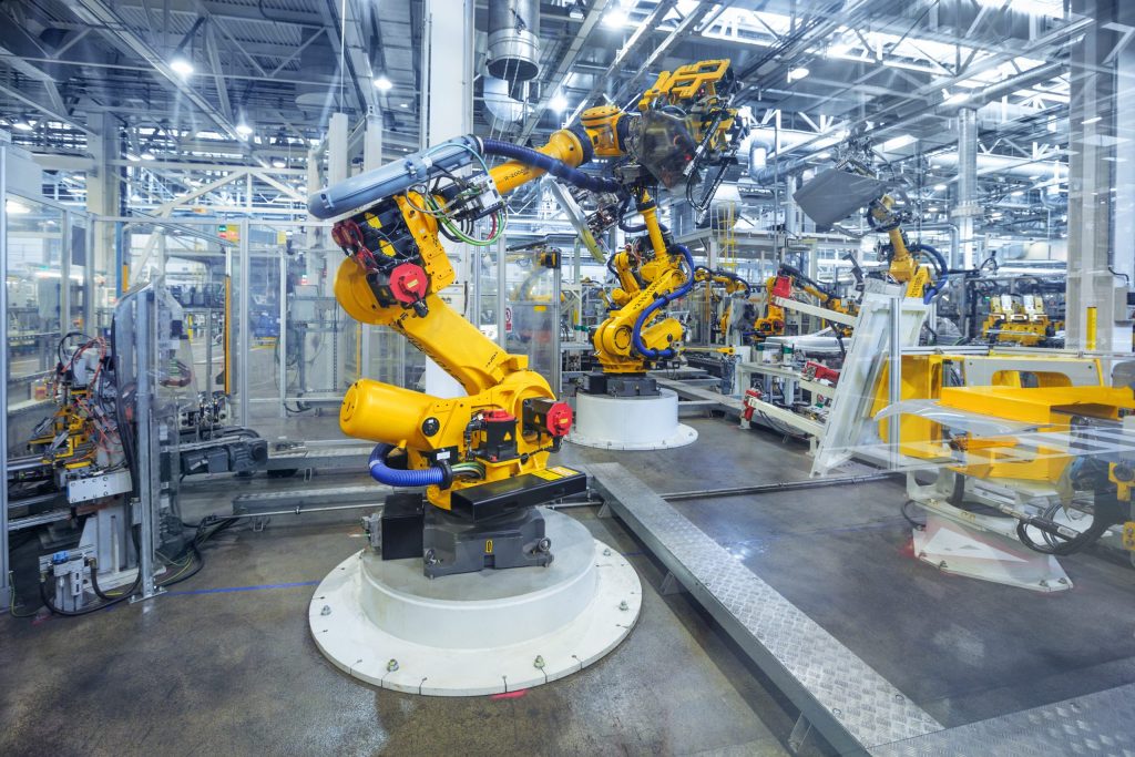 Robotic Arm for Automotive Industry Works in Large Facility