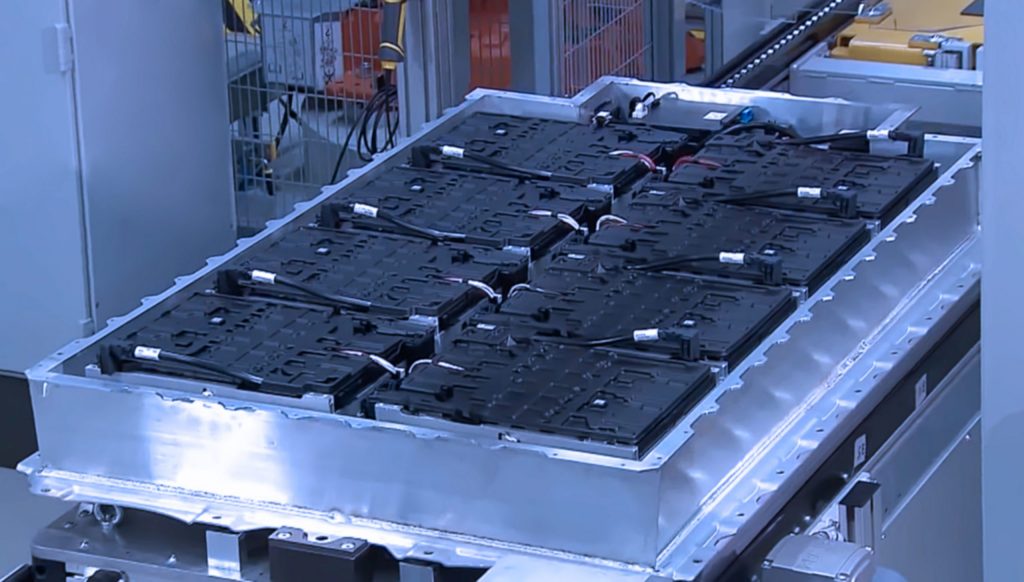  Battery tray for electric vehicle in the middle of being assembled. 